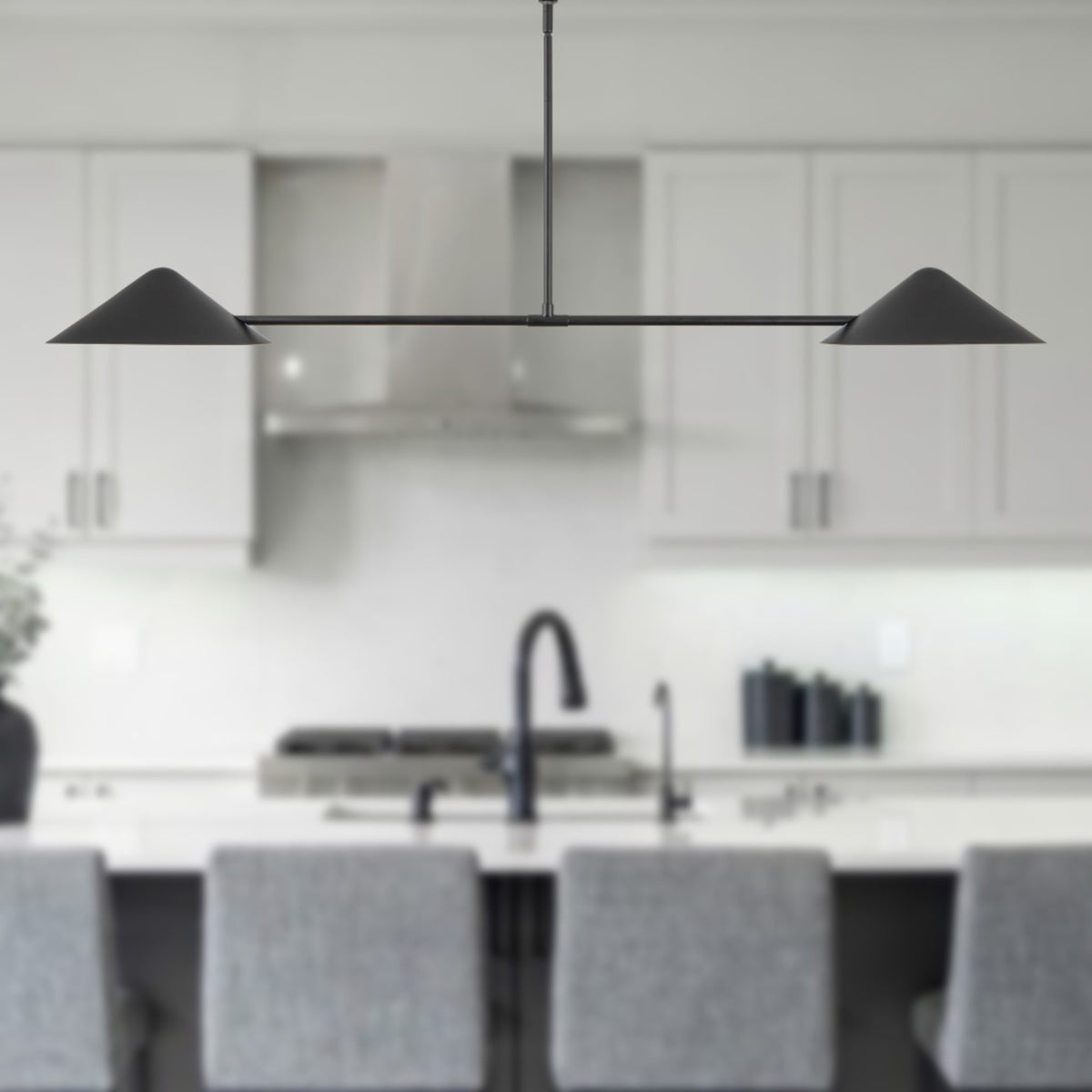 Alora Mood Ashford Linear Pendant in matte black finish over kitchen island
