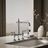 ARTIFACTS® DECK-MOUNT BRIDGE KITCHEN SINK FAUCET WITH LEVER HANDLES AND SIDESPRAY - robinsonco.ca