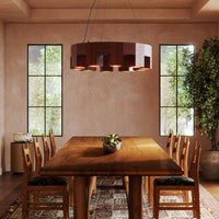Kuzco 38" Bosco Chandelier in walnut finish hanging over dining table