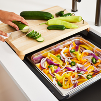 Blanco Inteos kitchen workstation sink with vegetables and cutting board