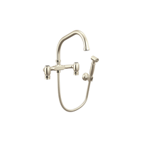 Brizo Faircroft wall-mount bridge faucet with angled spout and side spray in polished nickel
