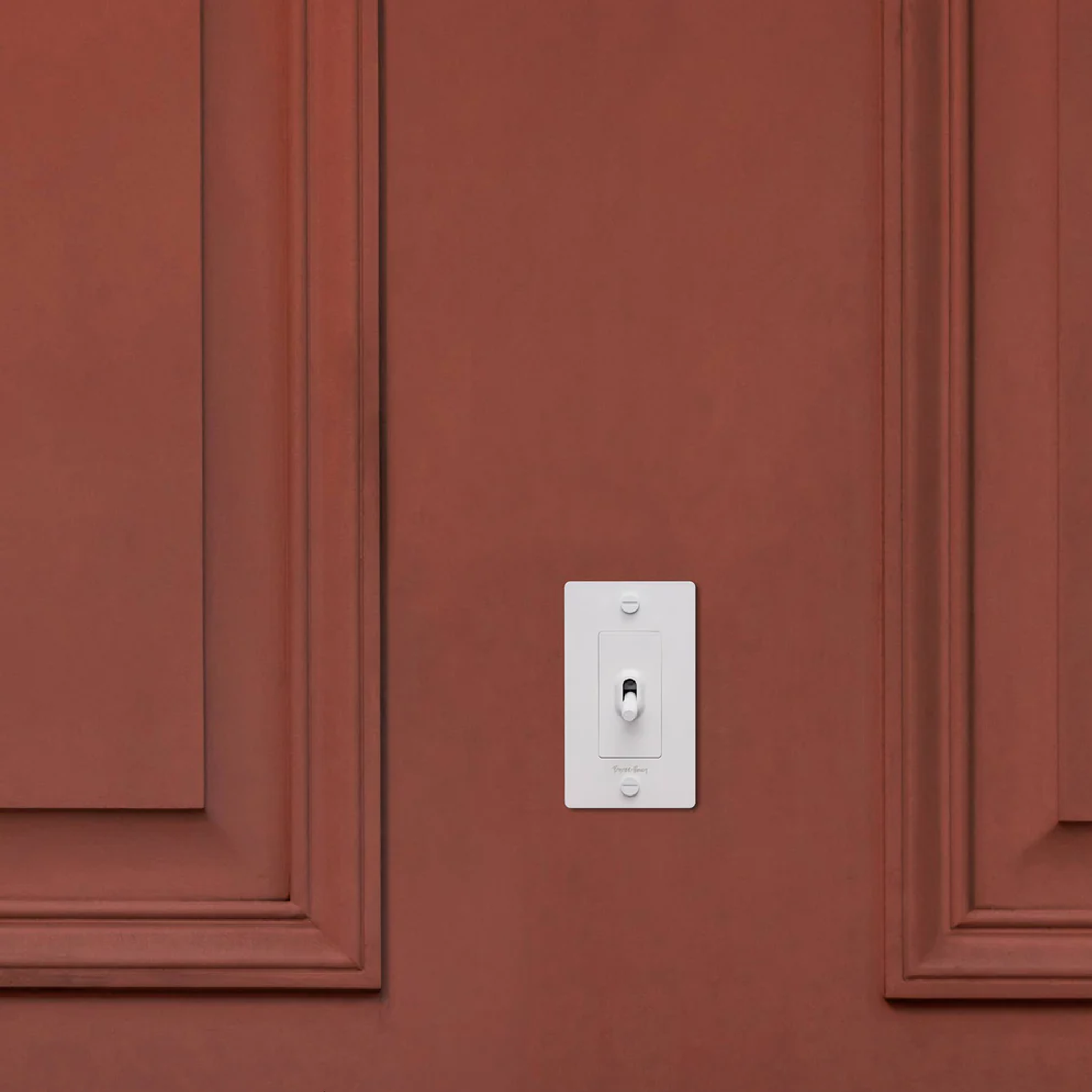 Buster & Punch White Light Switch 1 Gang Toggle with Cross design on Wall