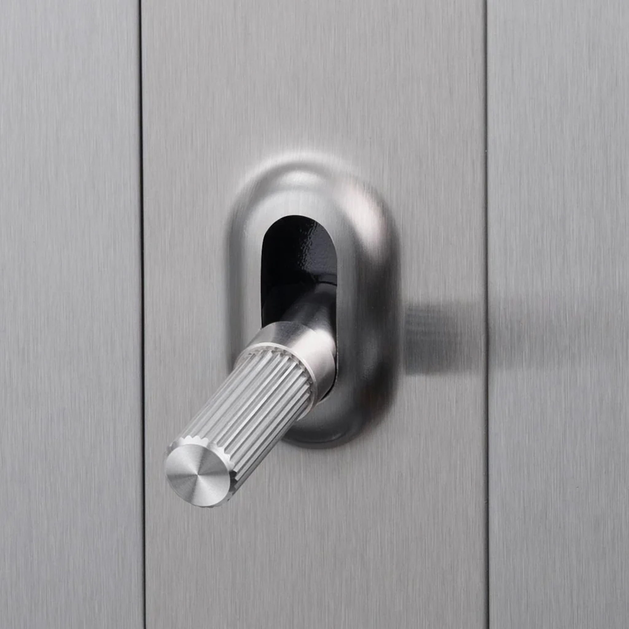 Close up of Buster and Punch 1 Gang Toggle Linear light Switch in Steel