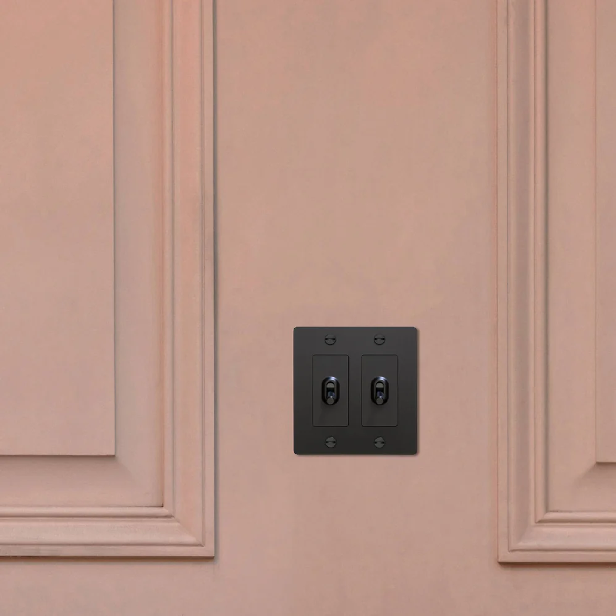 Buster & Punch Black Light Switch 2 Gang Toggle with Cross design on Wall