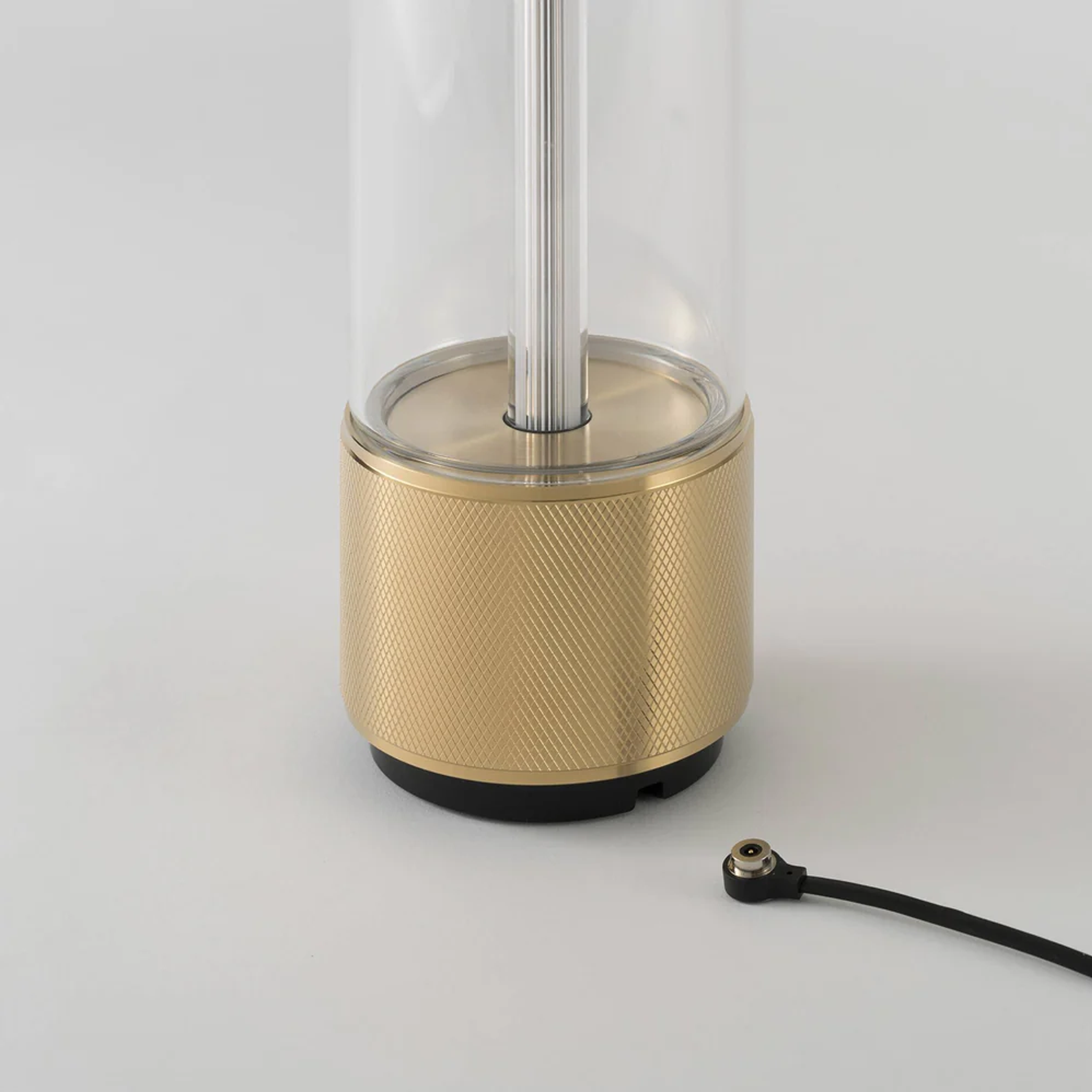 Buster and Punch rechargeable Takeout Table Light shown with charging cable.