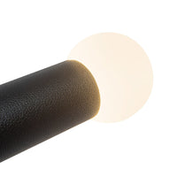 Kuzco Calla pendant light with brushed gold and black vegan leather finish