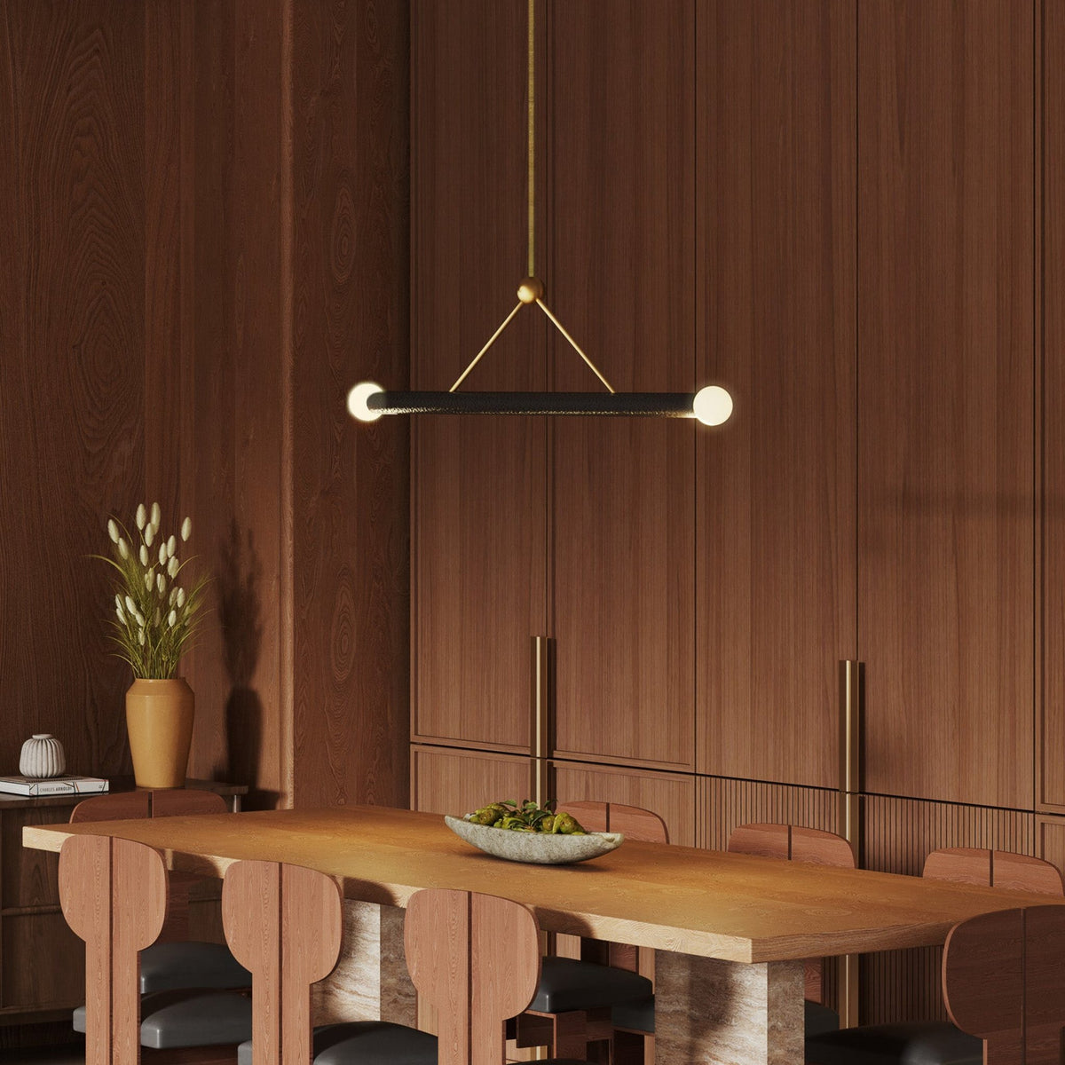 Kuzco Calla pendant light in brushed gold with black vegan leather