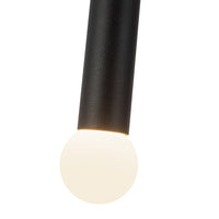Detail of Kuzco Calla pendant light with brushed gold and black vegan leather finish