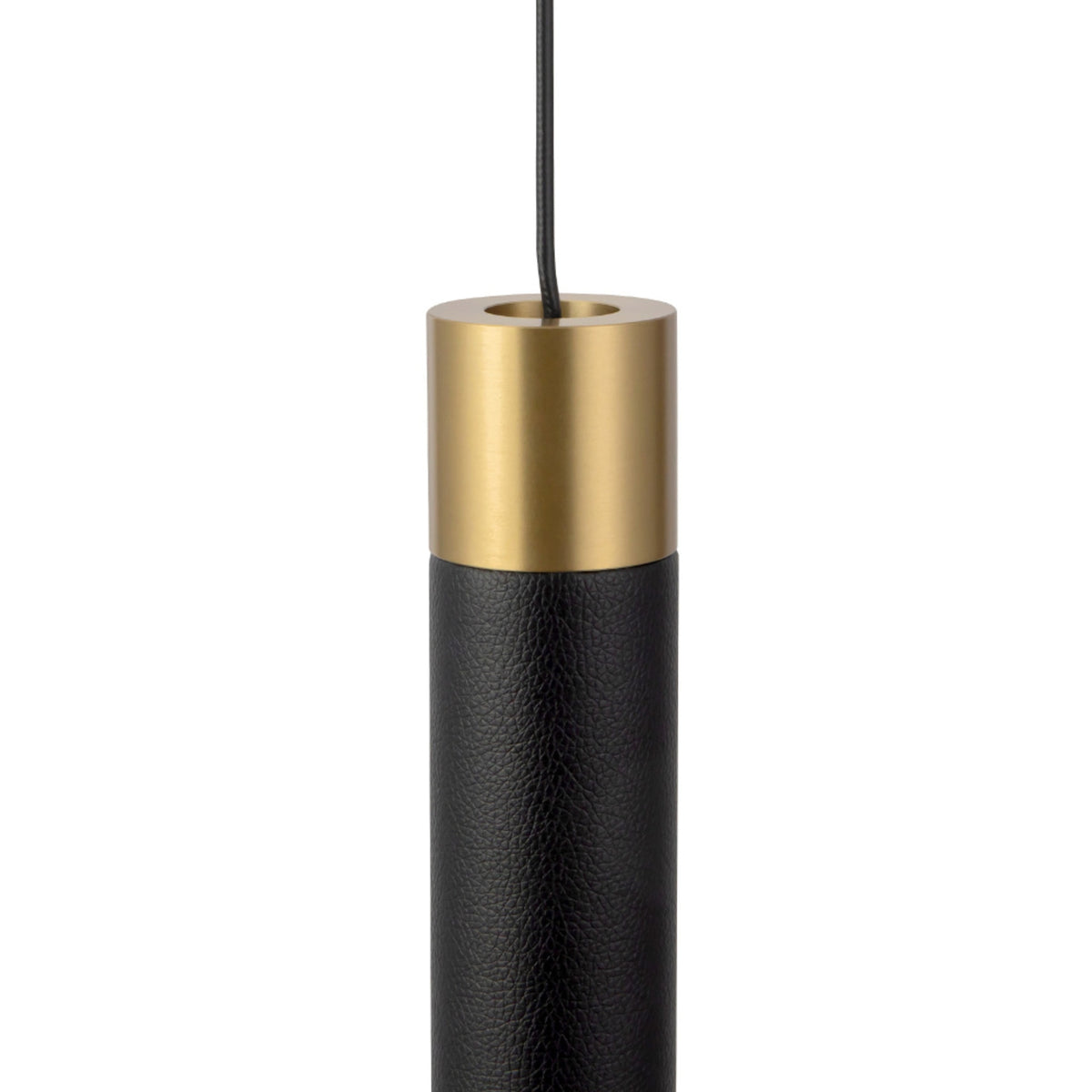 Close up of Calla pendant light with black leather and brass accents