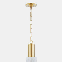 Close-up view of Corissa pendant light with gold brass chain