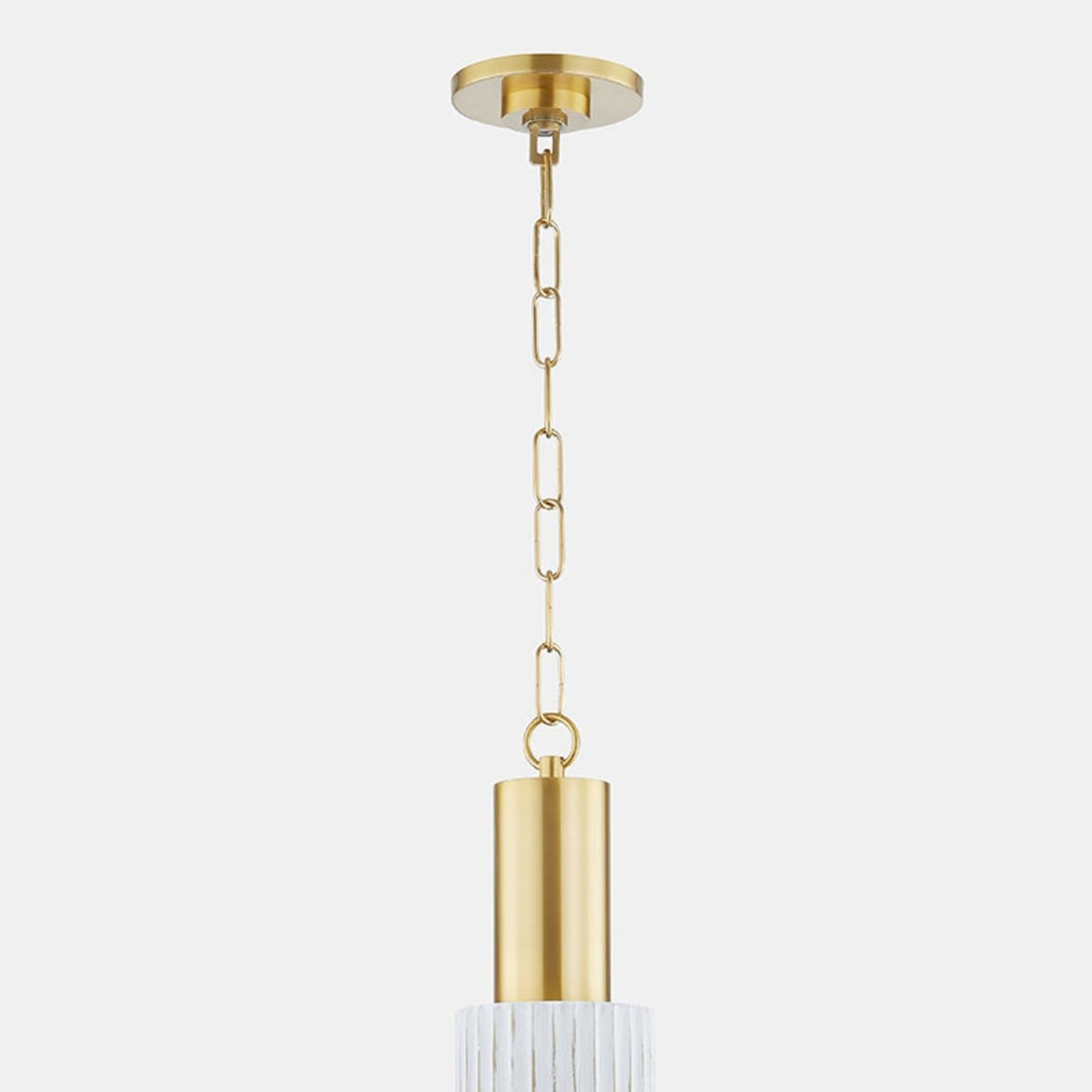 Close-up view of Corissa pendant light with gold brass chain