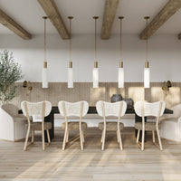 Hudson Valley Corissa pendant light with white ceramic shades over modern dining table