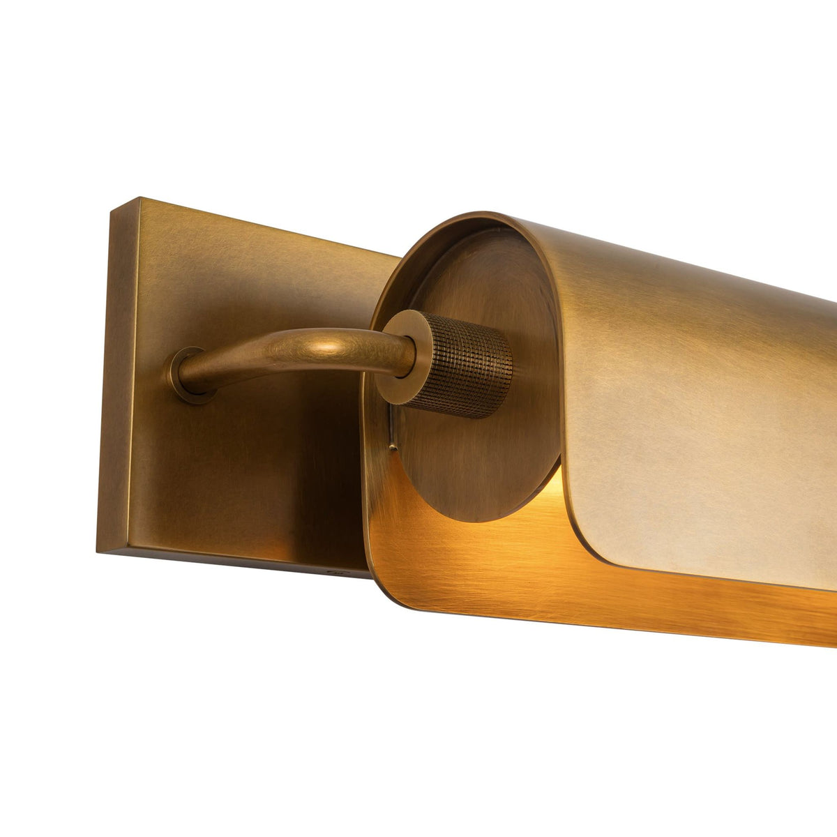 Close-up view of Alora Darby wall picture light in vintage brass finish