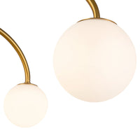 Close-up view of Alora Fiona Semi-Flush Mount light with brushed gold finish and matte opal glass