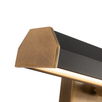 Close-up view of Alora Gemma Wall/ Picture Light in vintage brass and matte black finish