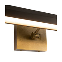 Close-up view of Alora Gemma Wall/ Picture Light in vintage brass finish