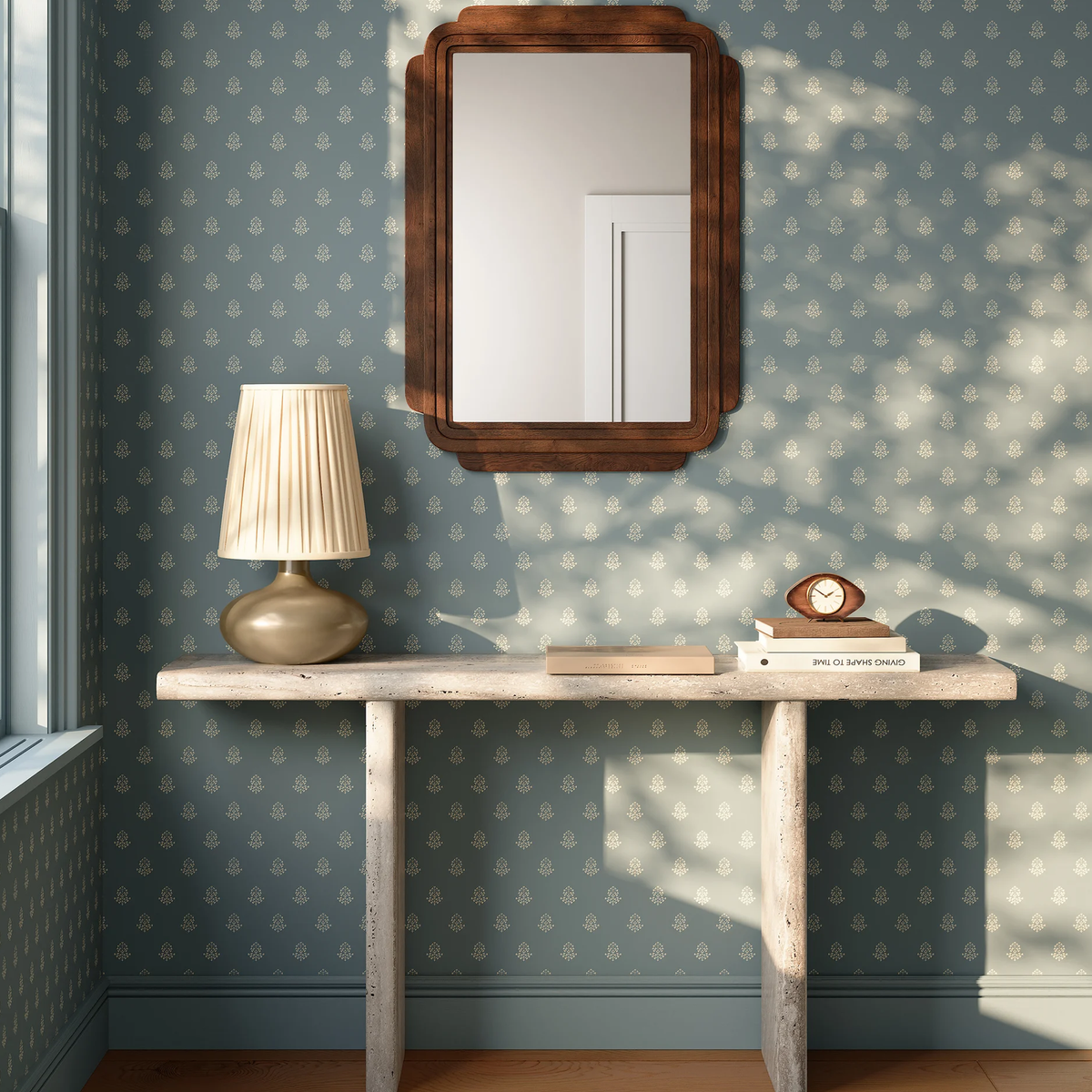 Clementine Table Lamp shown on a side table near a window.