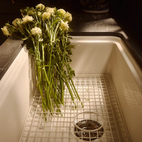 AUDRINE™ undermount single-bowl kitchen sink by Kohler with white flowers