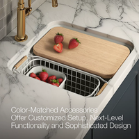 AUDRINE™ undermount bar sink by Kohler with wooden cutting board and basket