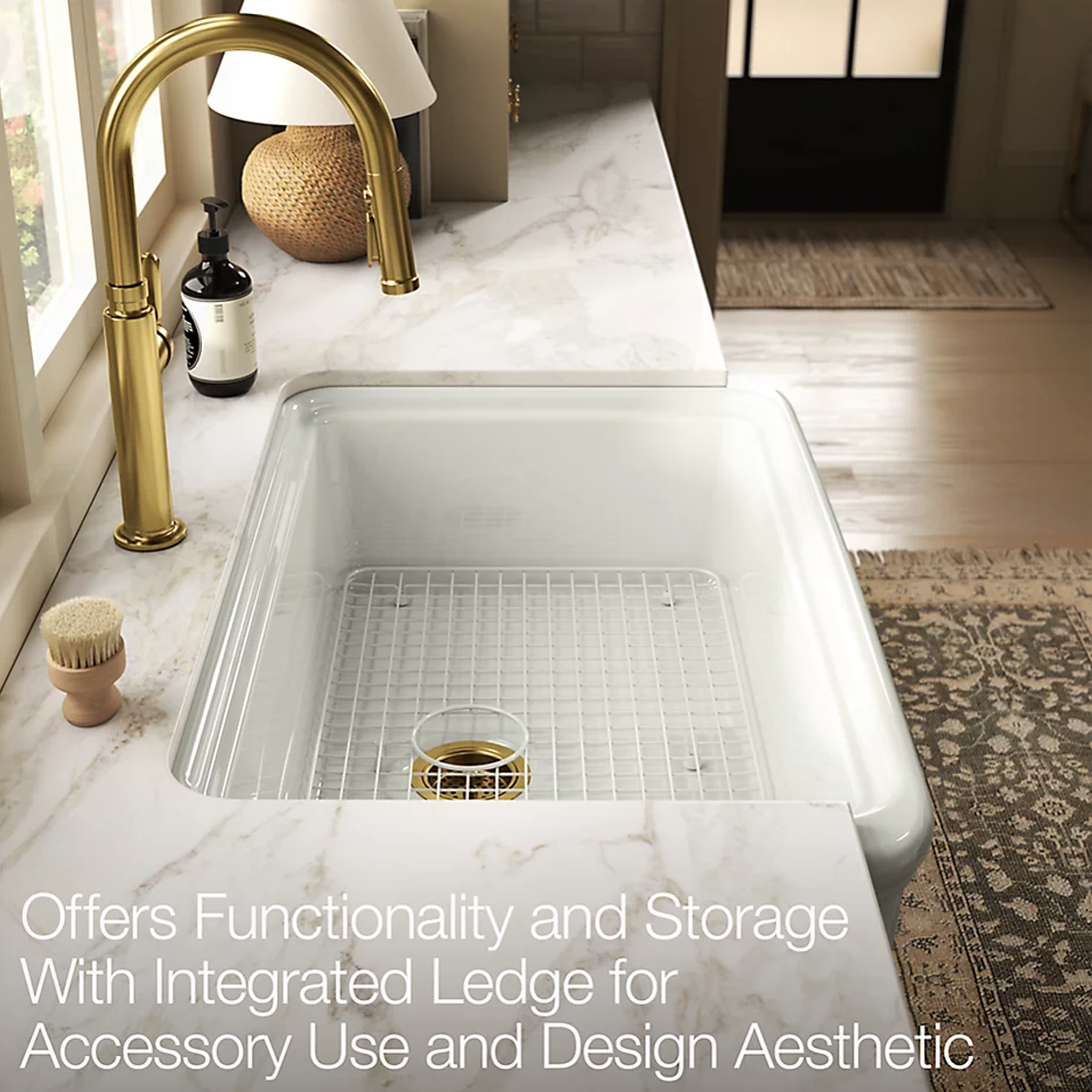 AUDRINE™ undermount single-bowl farmhouse kitchen sink by Kohler with gold faucet