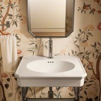 CLAUDE™ Console Table Bathroom Sink by Studio McGee by Kohler in white finish installed in bathroom with mirror.