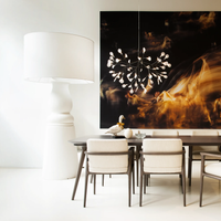 Modern dining room with a large Farooo floor light