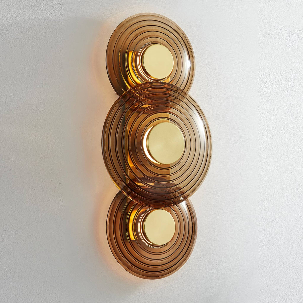 Hudson Valley Griston wall sconce shown lit.