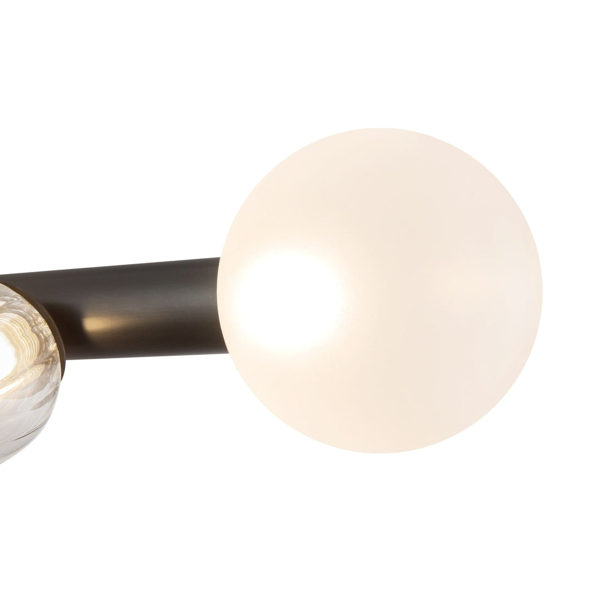 Details of Kuzco Reese Chandelier with urban bronze finish and matte opal glass globe