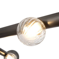 Details of Kuzco Reese chandelier in urban bronze finish with smoke glass