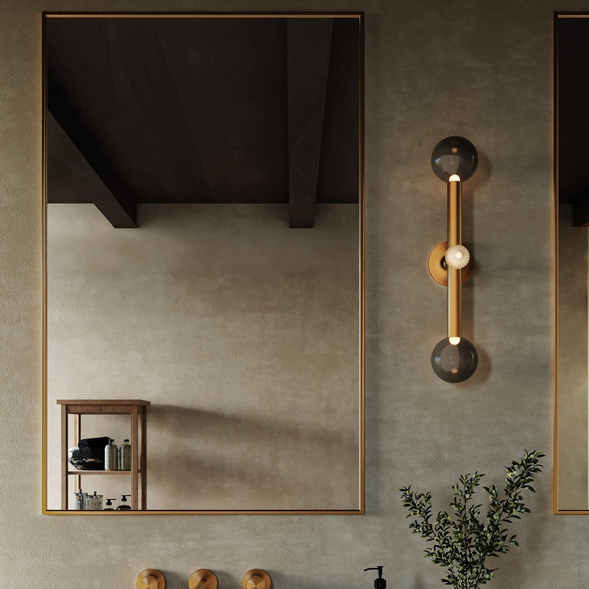 Kuzco 23" Reese Wall Sconce mounted beside a large framed mirror in a contemporary bathroom.