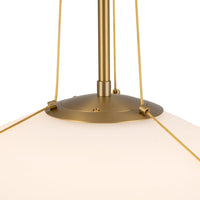 Close-up view of Alora Reeve Pendant Light with brushed gold finish and matte opal glass