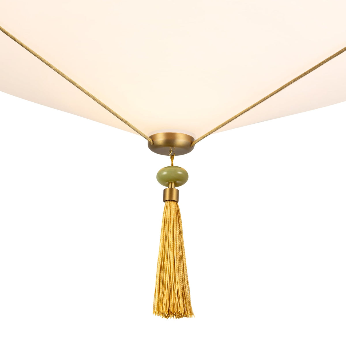 Details of Reeve pendant light fixture with gold tassel and green accent bead