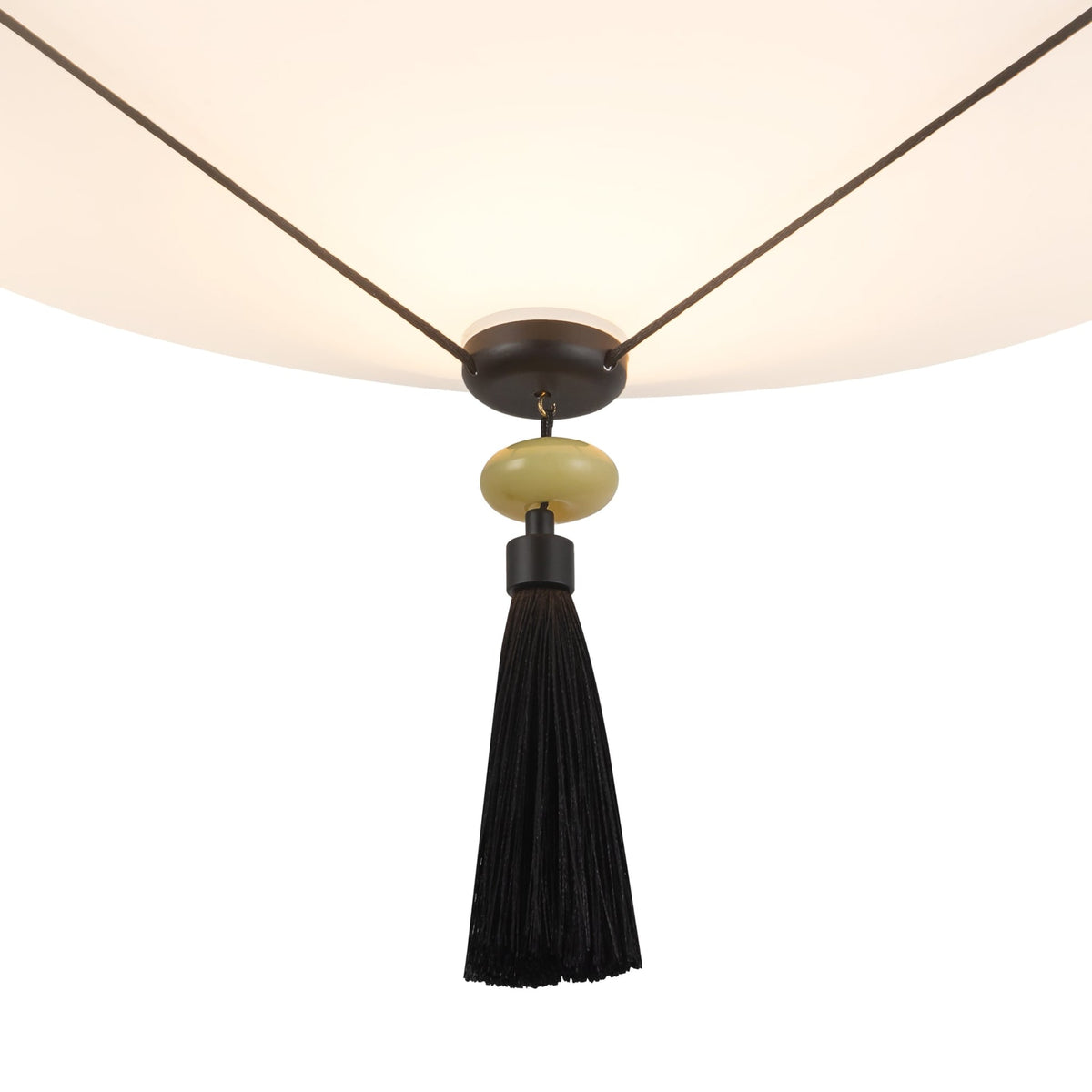 Details of Alora Reeve Pendant Light with matte black tassel and cream accent