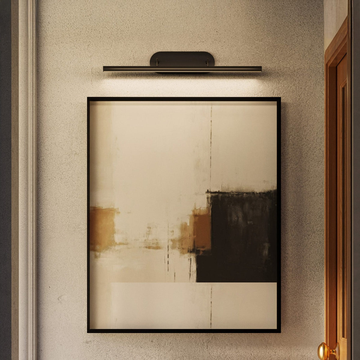 Kuzco slender wall picture light in black finish above abstract wall art