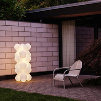 Tom Dixon Jack Portable Light glowing outdoors