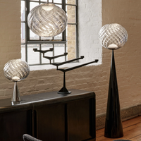 Tom Dixon Whirl Flat Cone floor lamp, pendant and table lamp with silver finish in modern interior