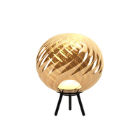 Tom Dixon Whirl LED portable floor light in gold finish