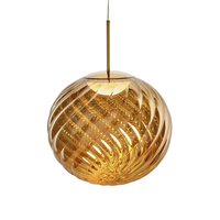 Tom Dixon Whirl LED Pendant in gold color