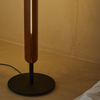 Close-up shot of on the base of Flos Seki-Han floor lamp in a cozy room